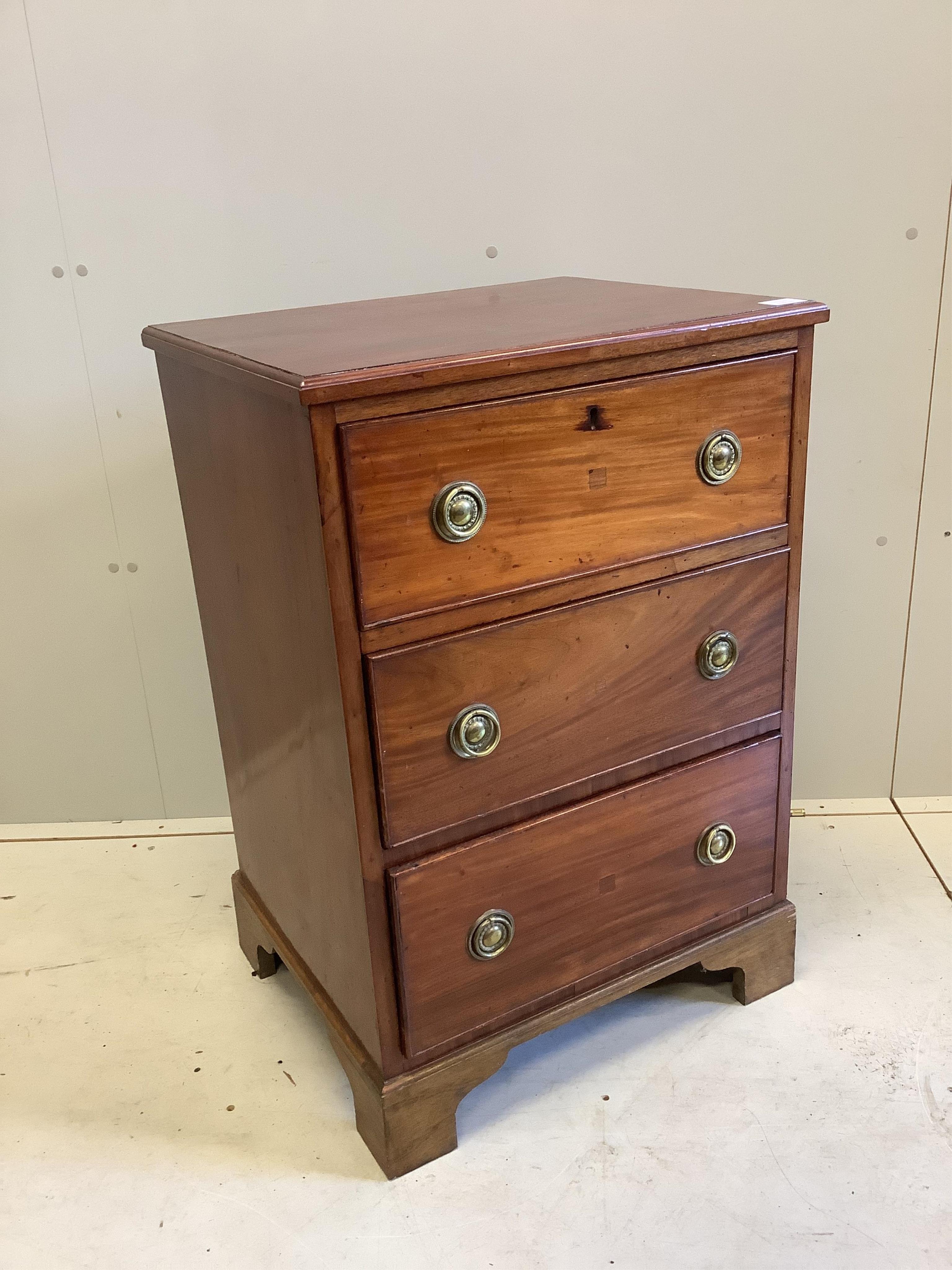 A George III style mahogany chest, fitted three long drawers, width 58cm, depth 47cm, height 85cm. Condition - fair